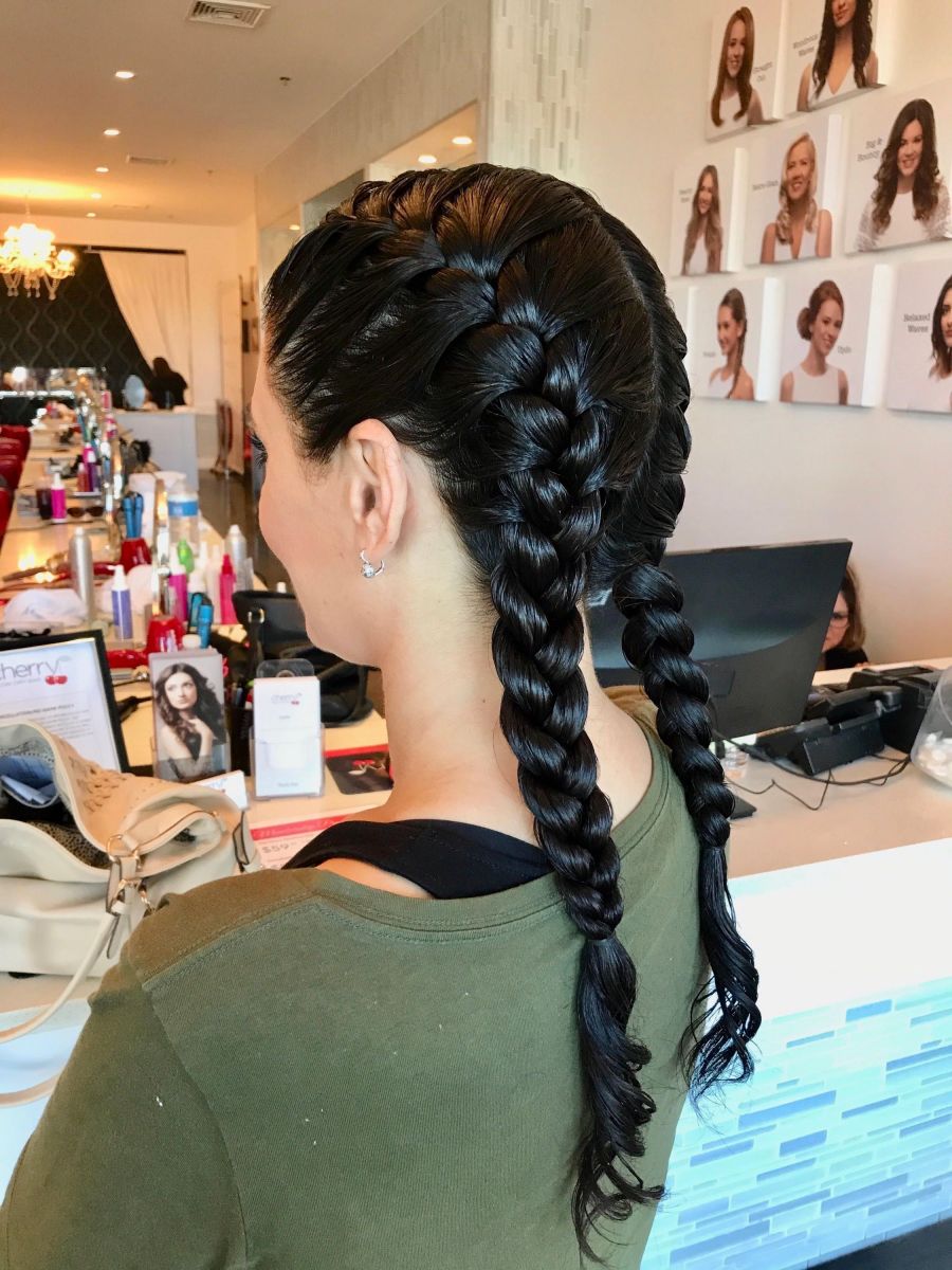 Double braided ponytail . summer hairstyles for black women on blow-dried  hair 