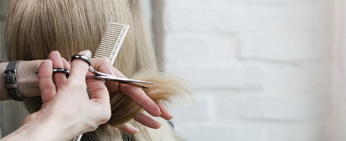 Healthy curls that look bouncy. Hair styling in beauty salon